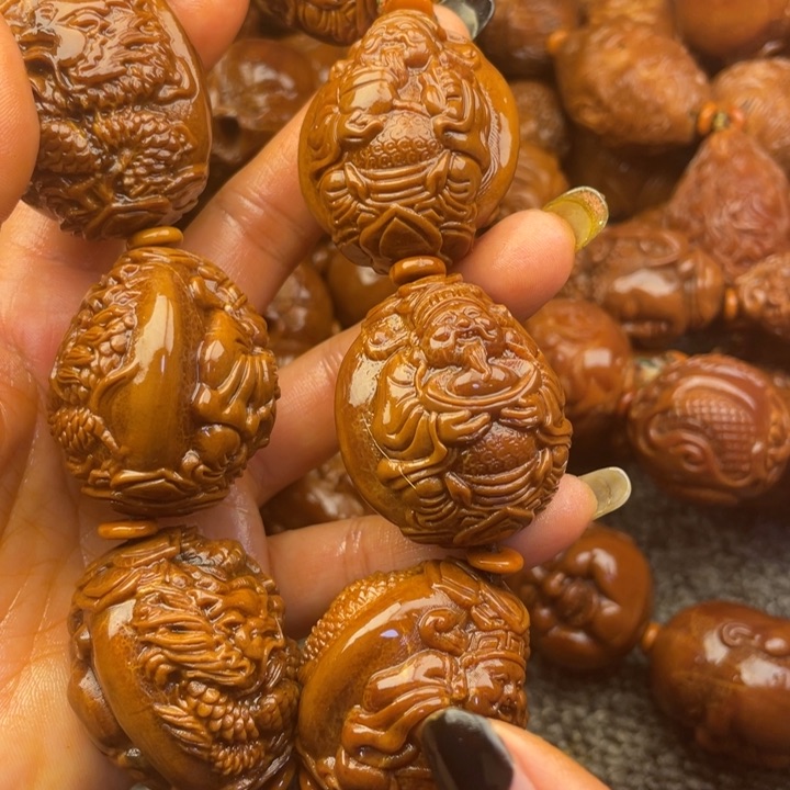 橄榄核吊坠龙**育橄榄核