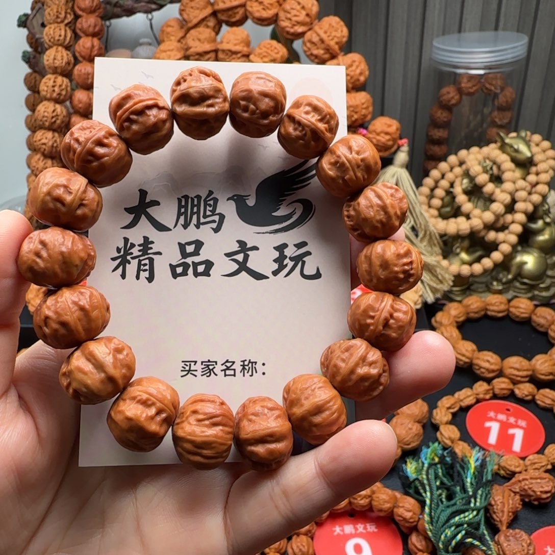 孟***啊桃核吊坠核桃手串