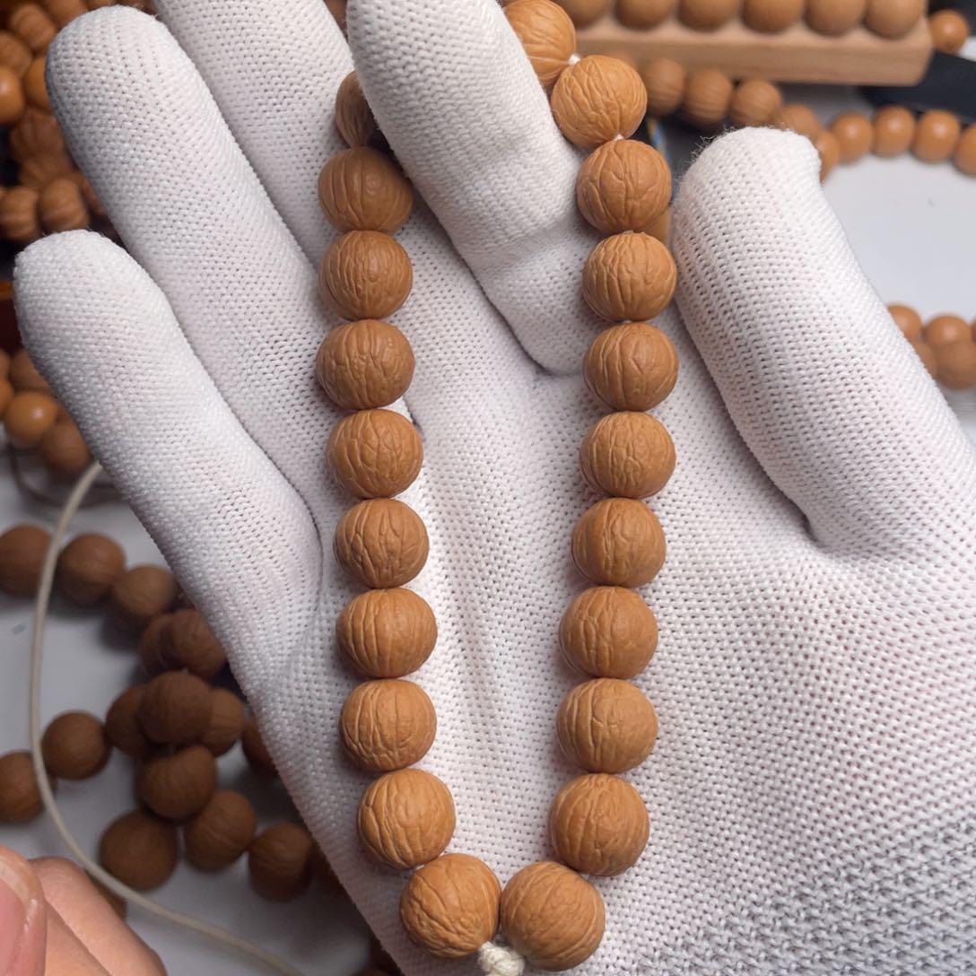 猴头核桃手串7纯天然无修凤羽