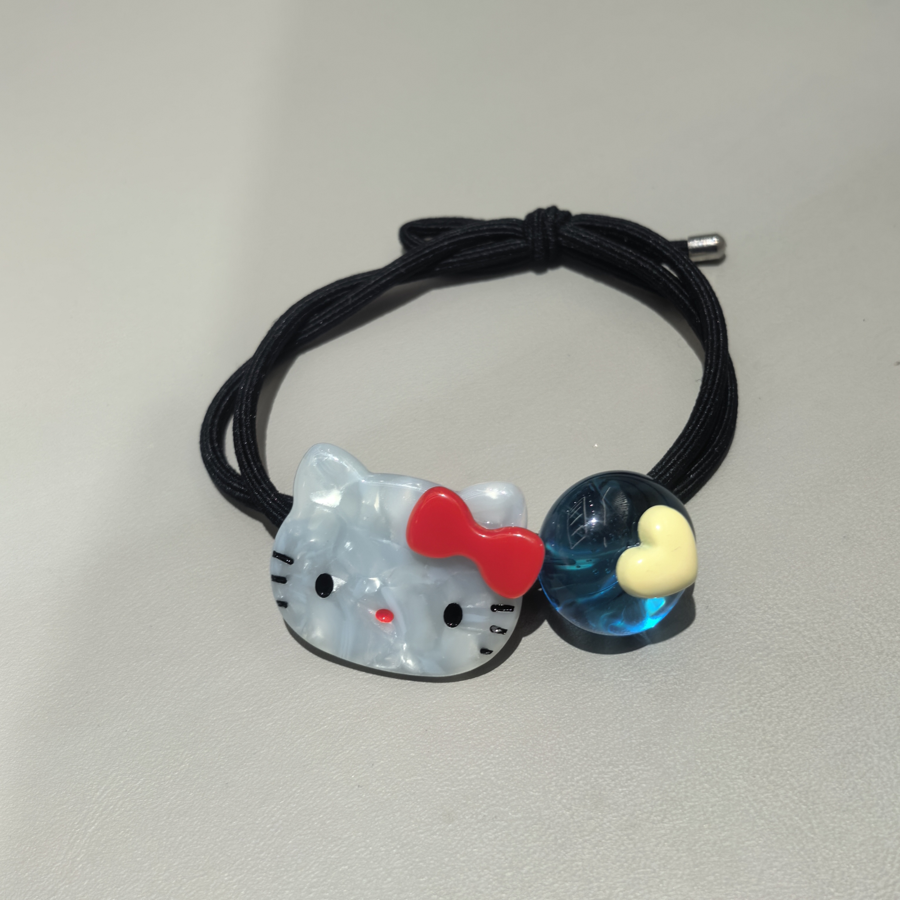 F492红色蝴蝶结KT猫咪蓝色冰透球发绳