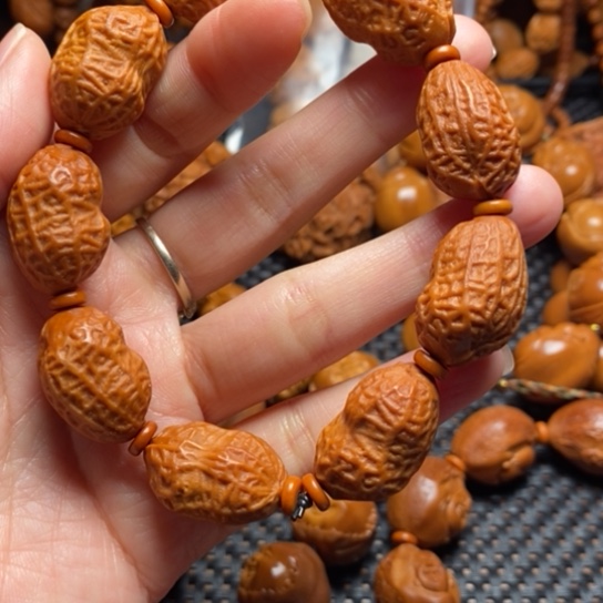 橄榄核吊坠花生手串