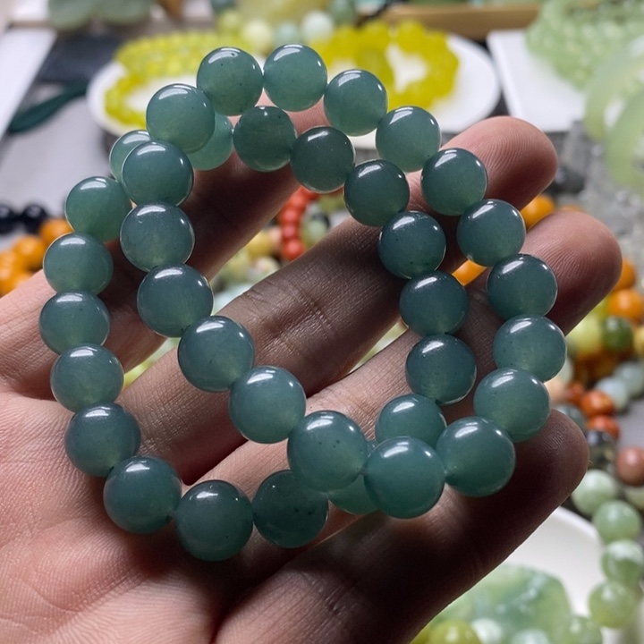 松***子蛇纹石玉未镶嵌颈饰