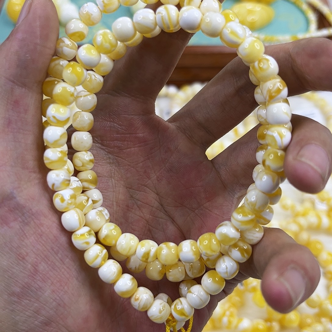 淇***淇蜜蜡未镶嵌手串同料7mm瓷白108手串