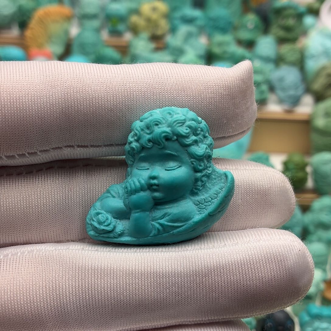 孙***子绿松石未镶嵌饰品