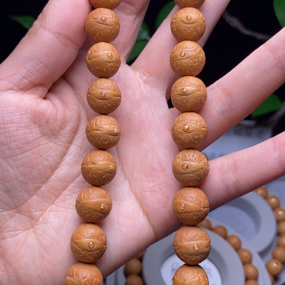 凤眼菩提吊坠12.5手持