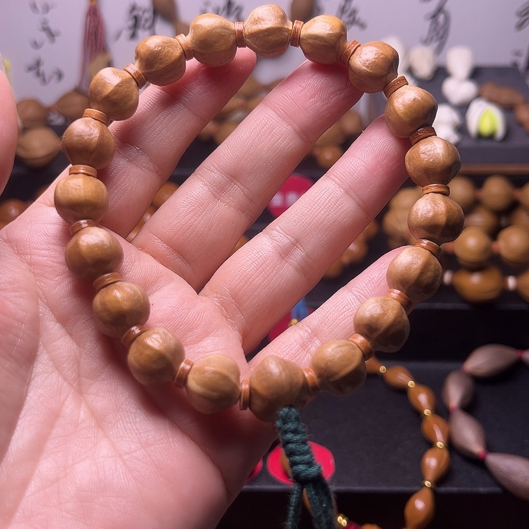 軍***橄榄核手串梅林蜜桃臀12花皮微瑕疵