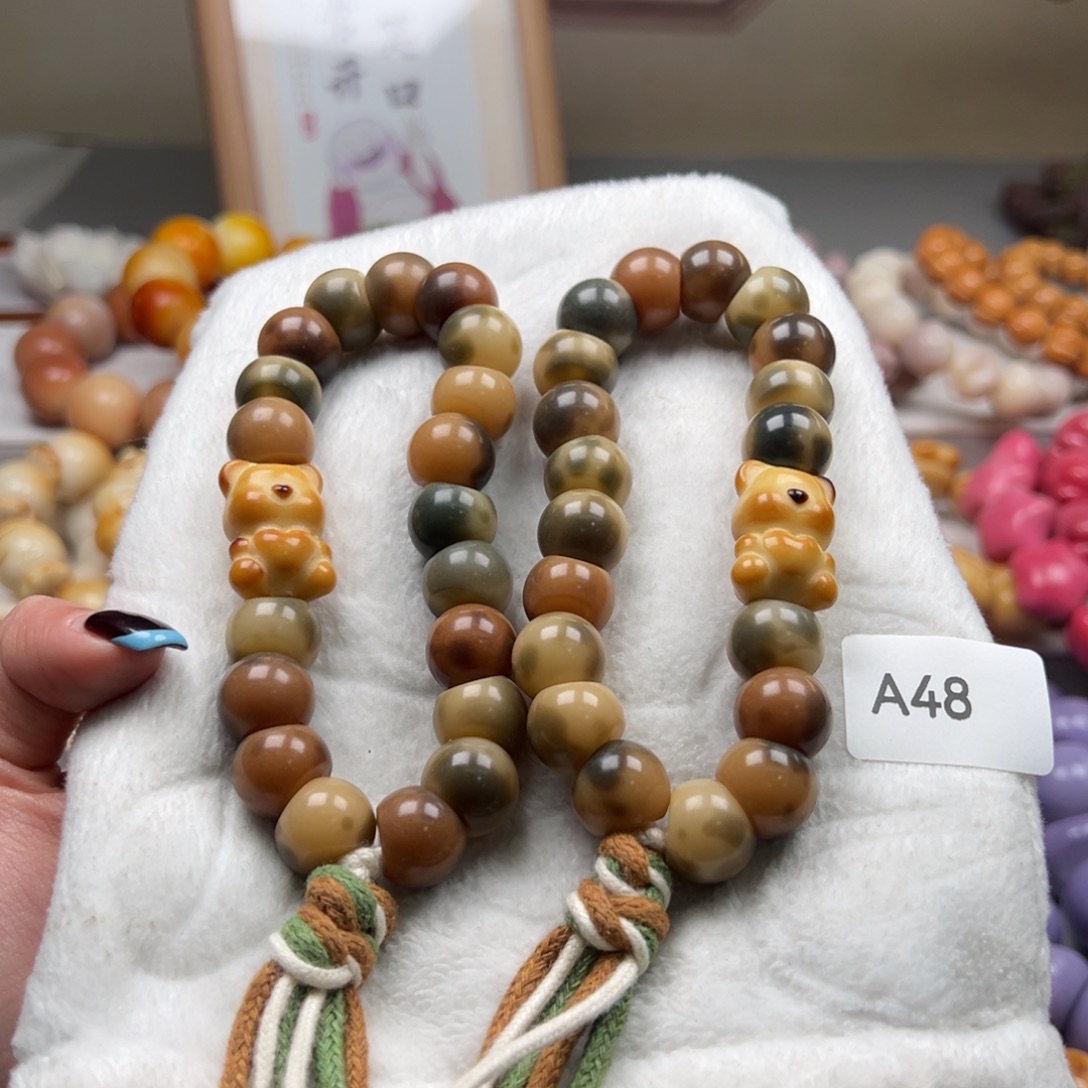 菩提根/象牙果吊坠通货a48蒜瓣手持随机一串14m