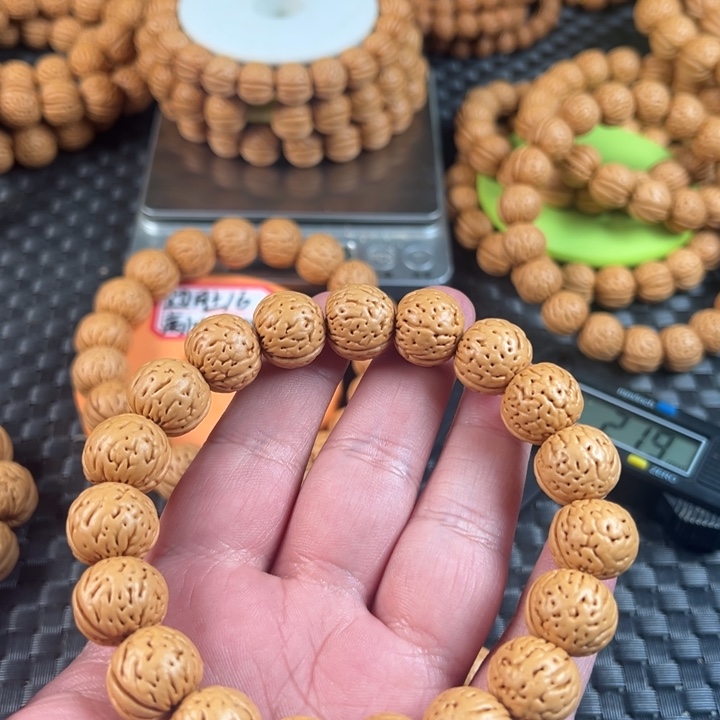 楚***辞桃核手串15金丹桃核