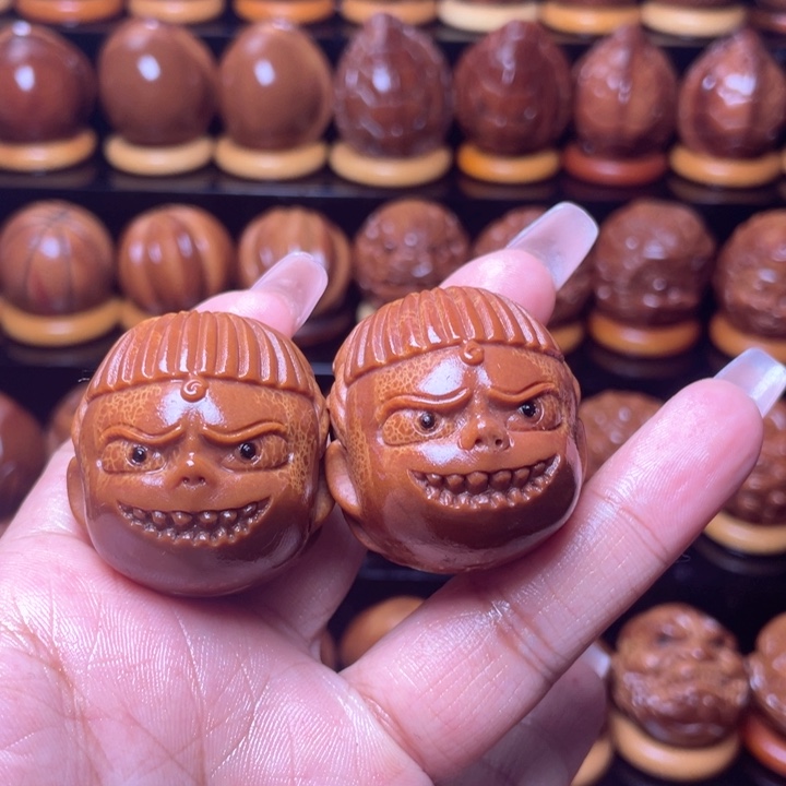 橄榄核把件打*人橄榄雕刻