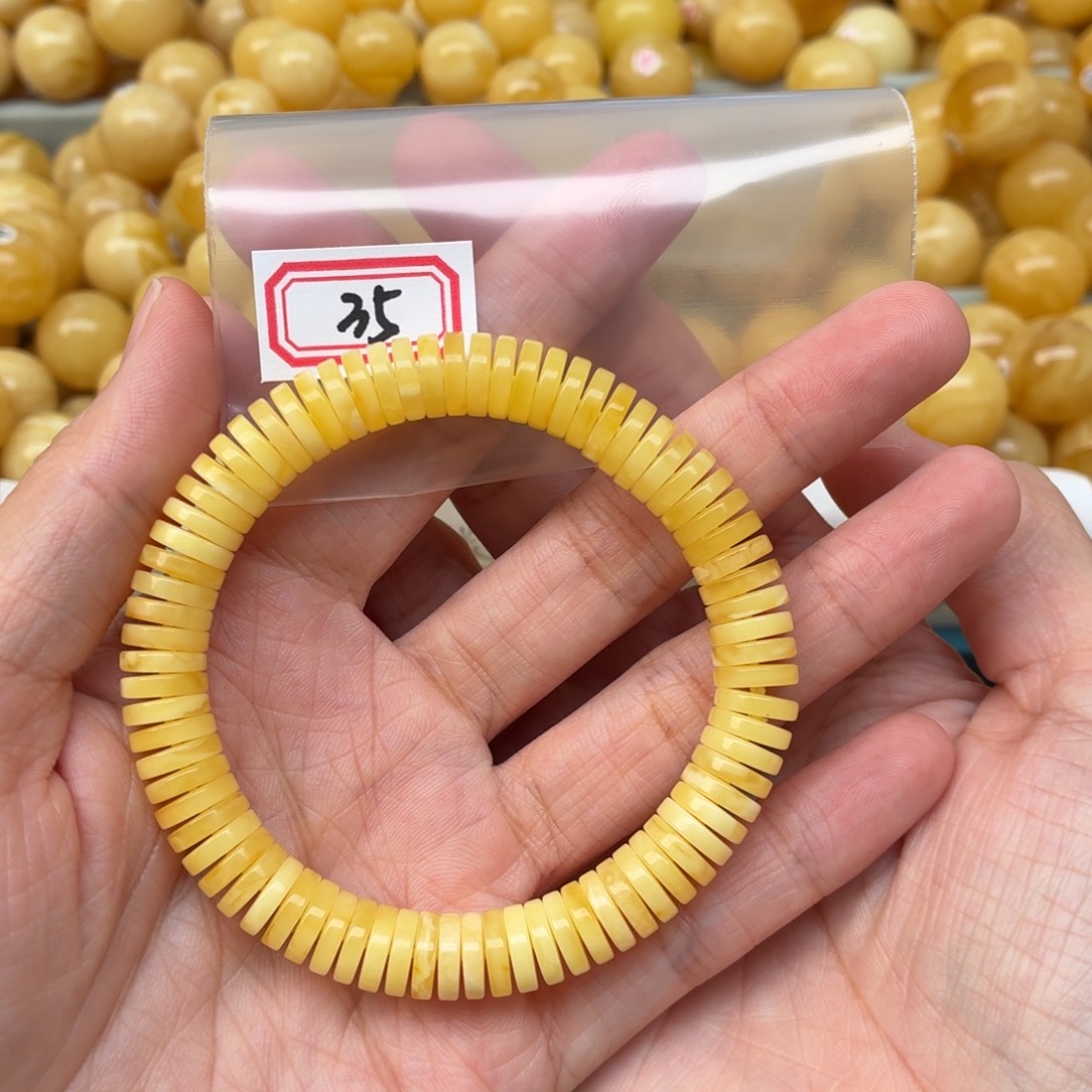 美***见蜜蜡未镶嵌裸石9+药片手串微瑕