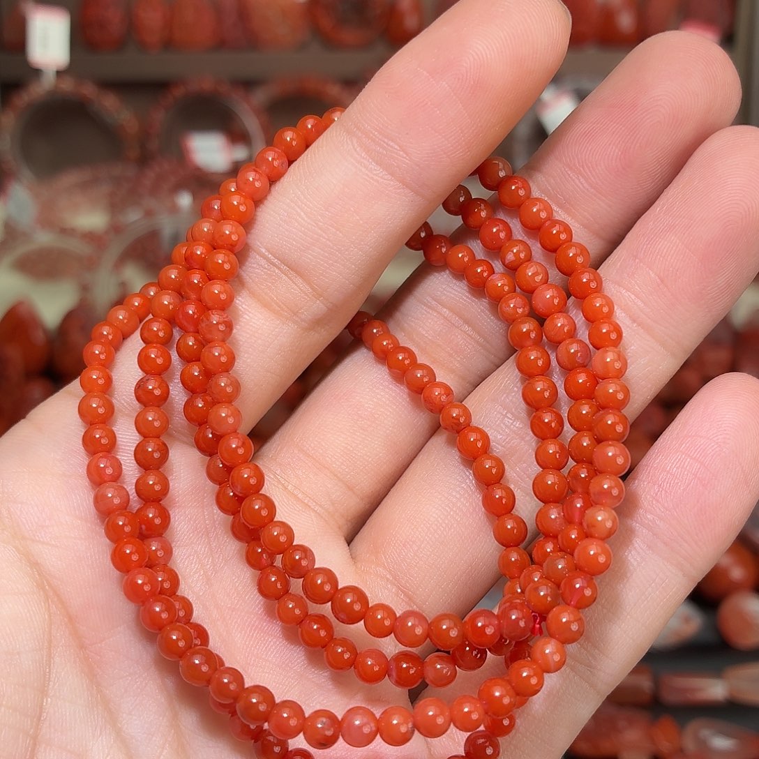梁***倩南红玛瑙未镶嵌颈饰柿子红小米珠4+