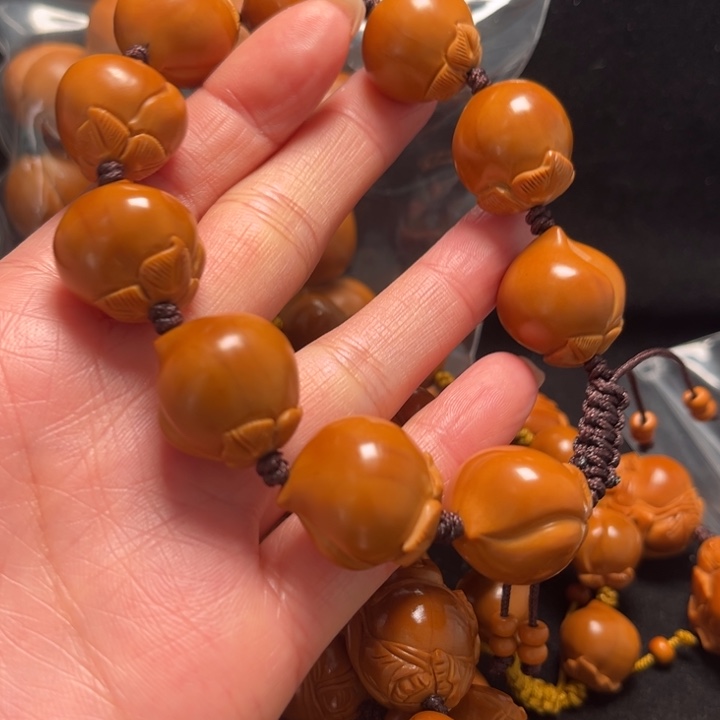 尼***根手串橄榄核寿桃18