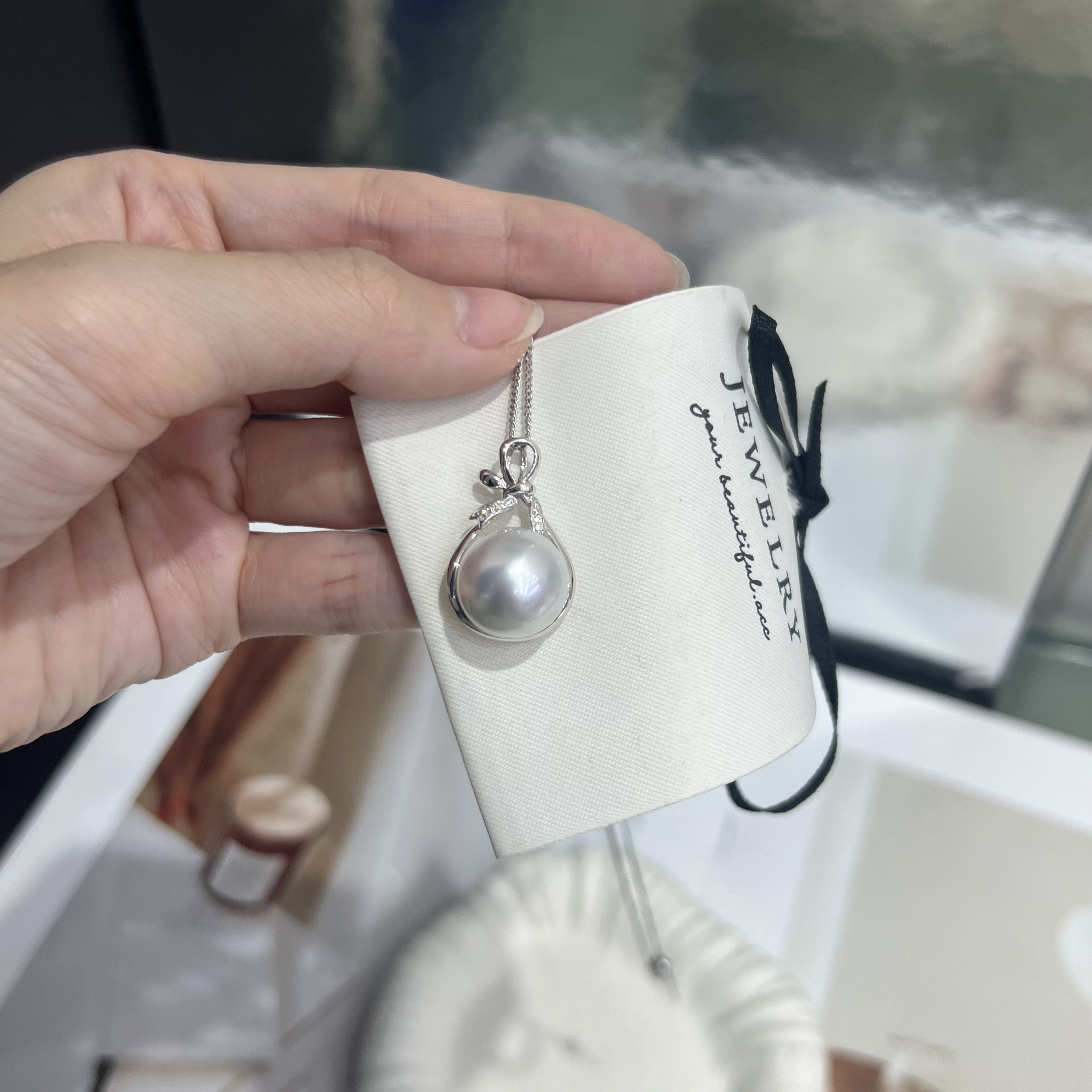 澳白吊坠银蓝光13.5mm福袋蝴蝶结款