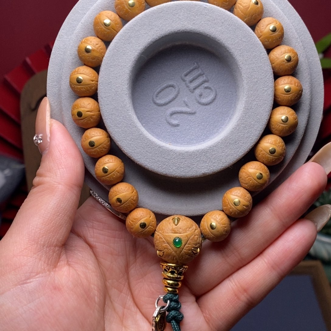 @***涛凤眼菩提手串11铜