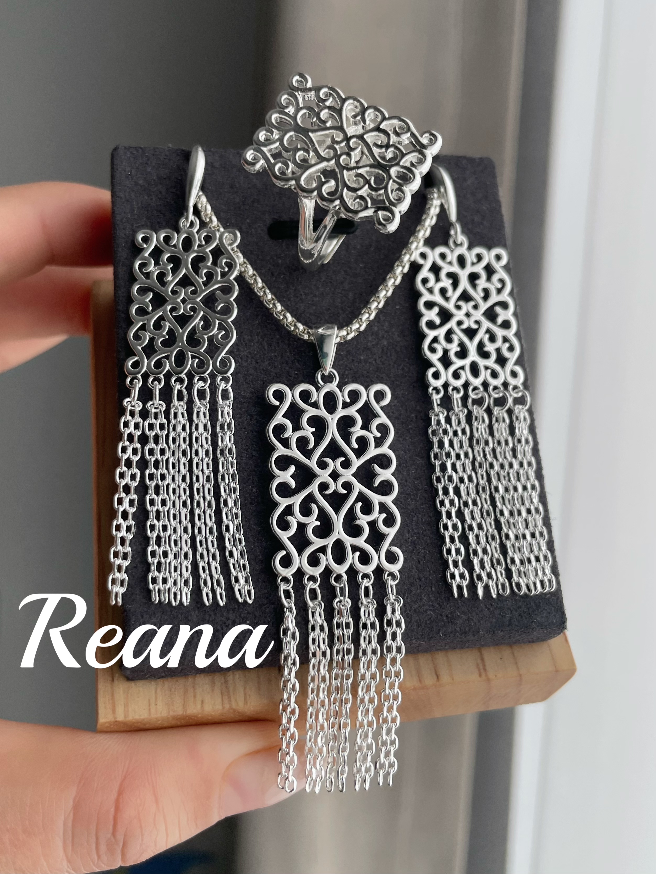 钛钢耳饰 OYU雕花方流苏