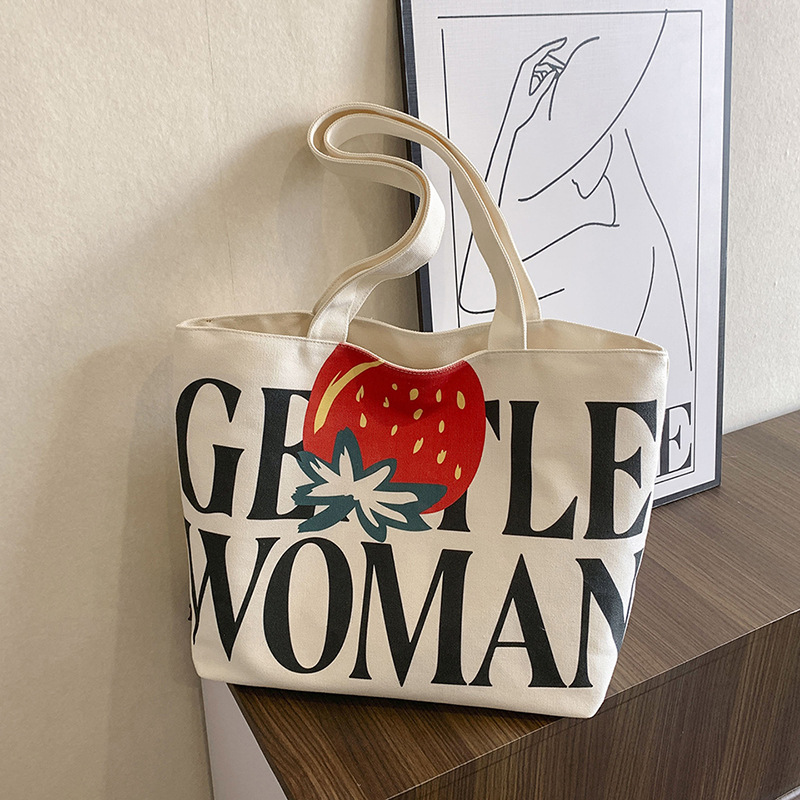 向日葵字母帆布包2025新款大容量印花单肩托特包质感补课袋购物袋