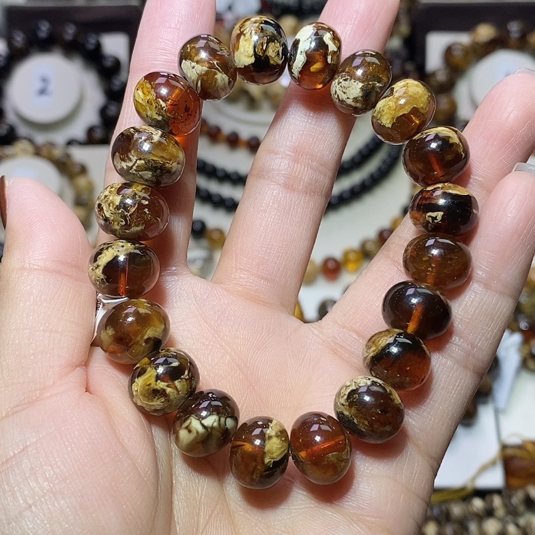 征***途琥珀未镶嵌裸石血底溶洞12