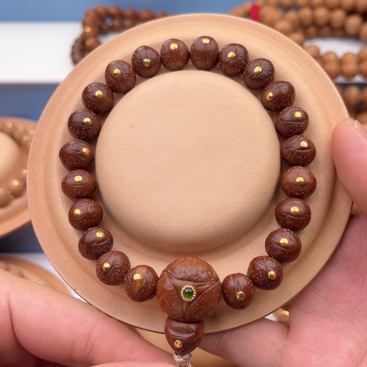 凤眼菩提手串11实心籽红串