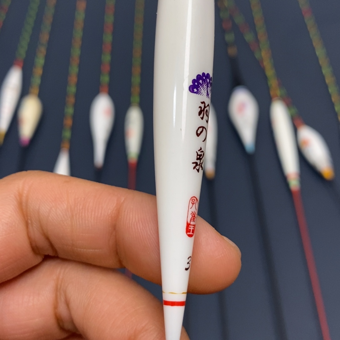 交***生孔雀羽带壳羽毛50长1.0的尾吃铅3.1克