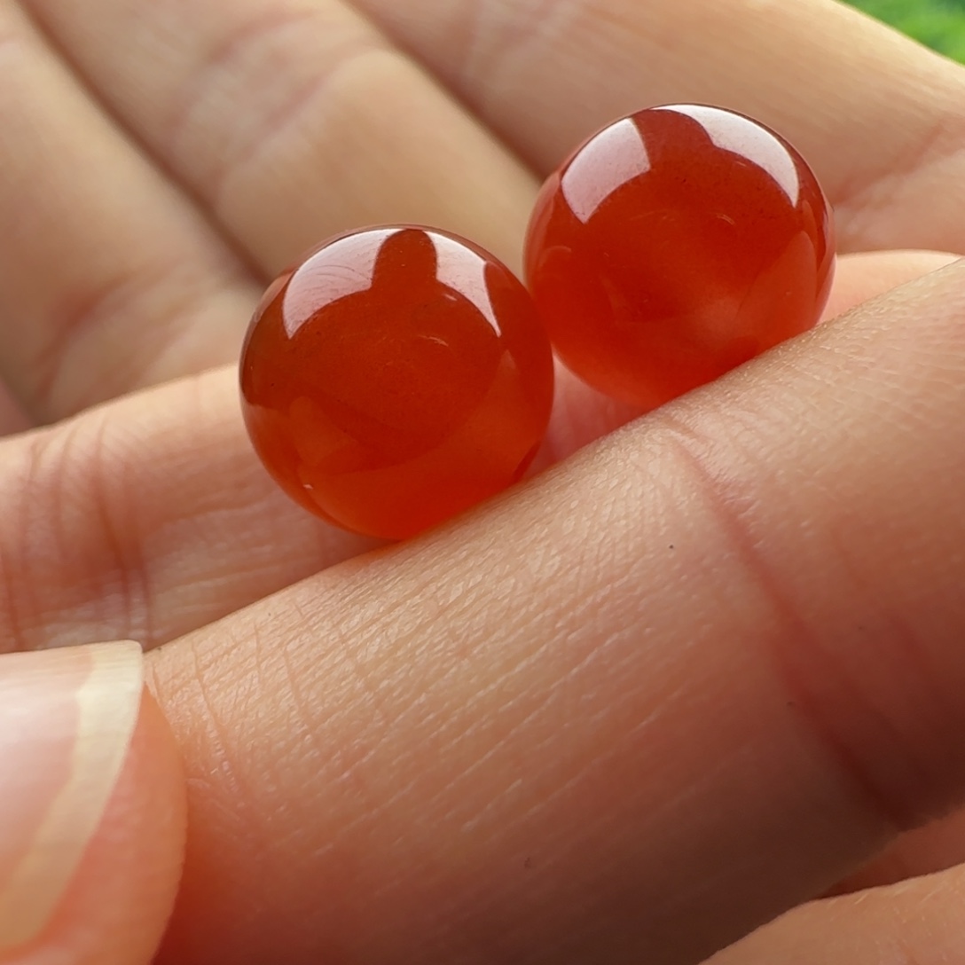 南红玛瑙未镶嵌圆对珠：11冰红满砂 有包容 原矿不烤色