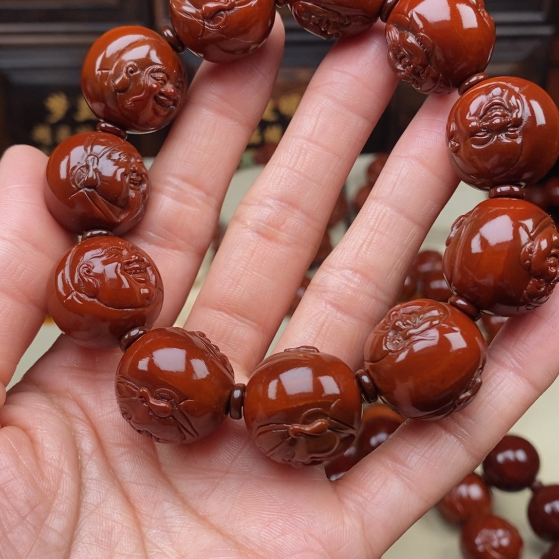 橄榄核吊坠张*财迷，