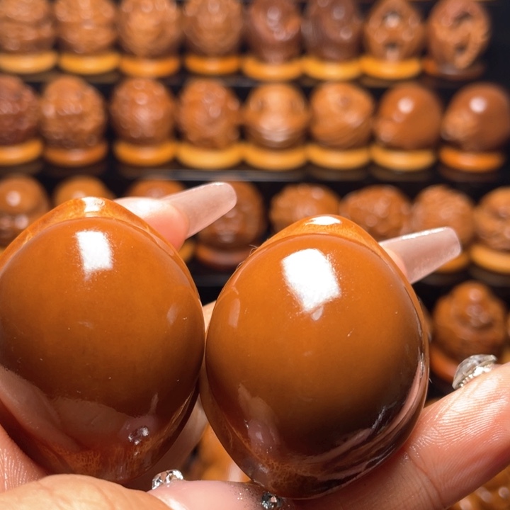 橄榄核把件擎**子橄榄雕刻