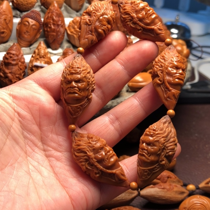 多***人橄榄核吊坠橄榄核雕刻的手串