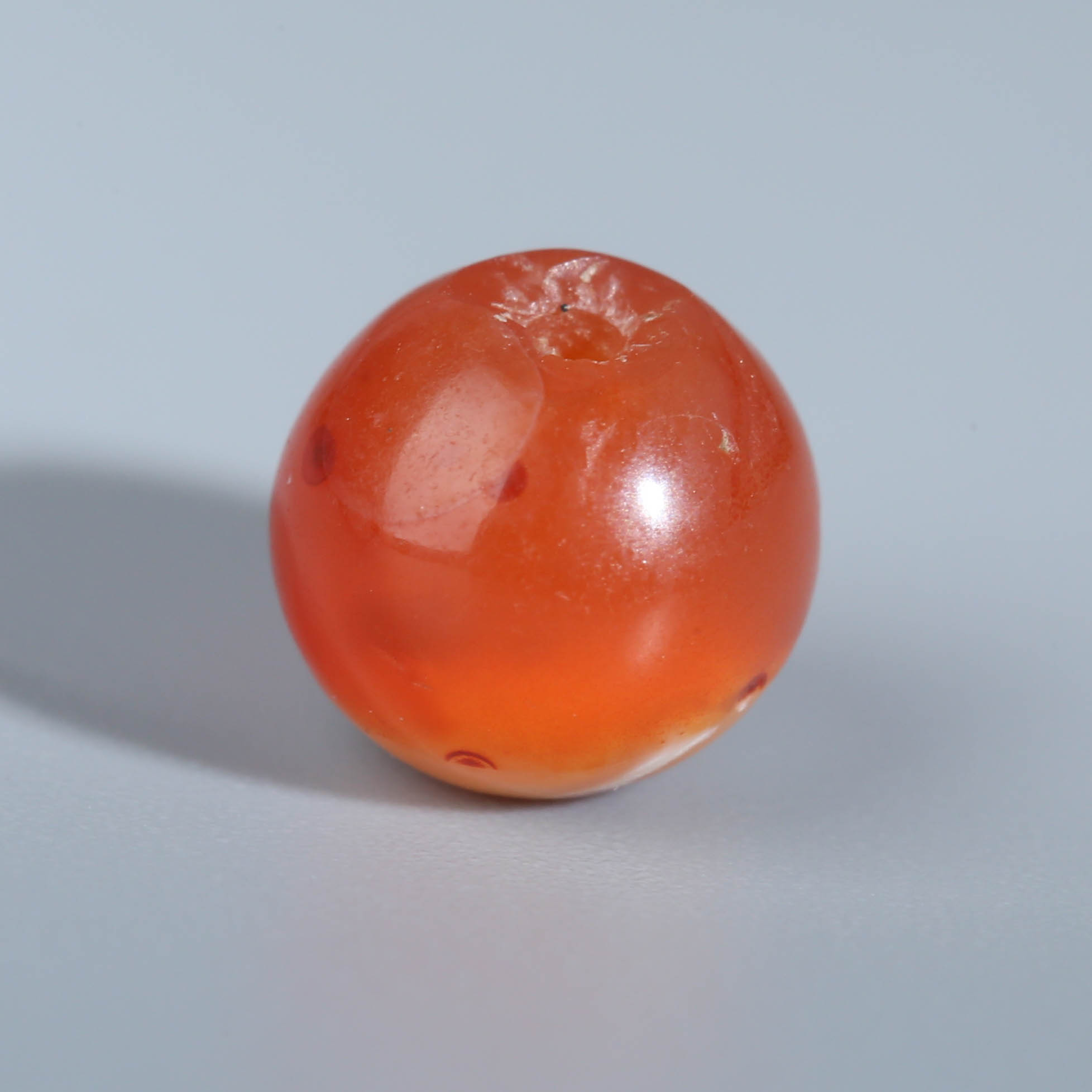 XY71-13  东南亚pyu时期带奶皮红玉髓圆珠 6.3*6.2mm
