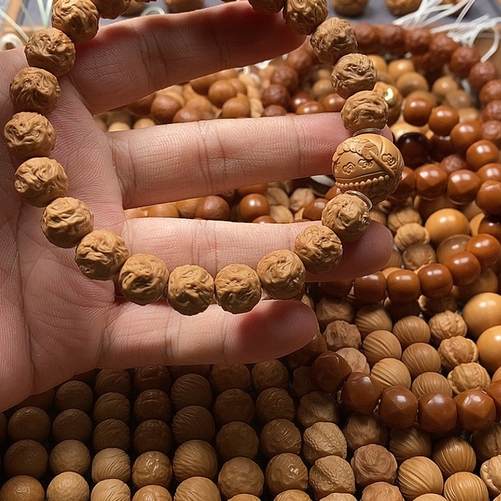 顾***怨猴头核桃手串游龙