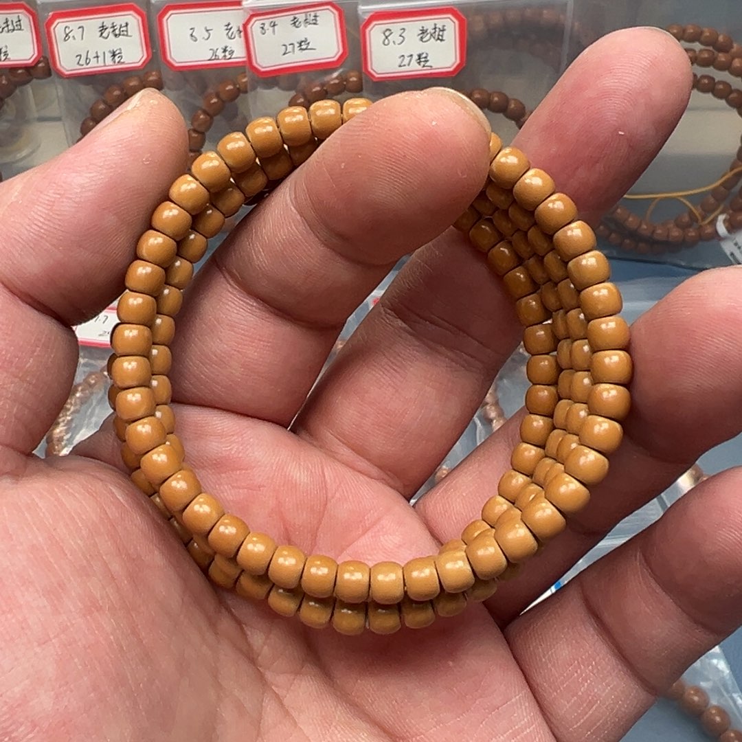 橄榄核吊坠老挝核尖单圈手串5.2mm