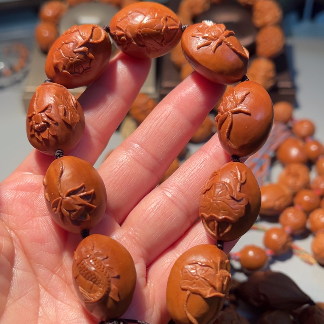 橄榄核手串/手链荷花鱼