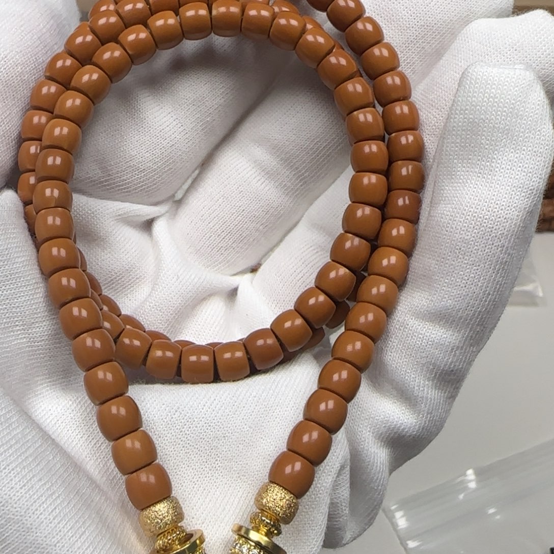 手串橄榄核老挝长串极限弧微白6.2mm