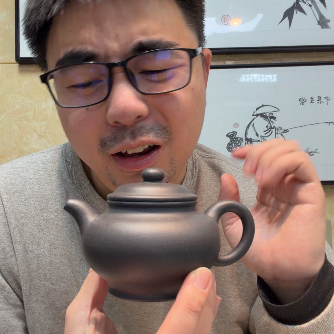 茶杯紫砂微瑕的壶