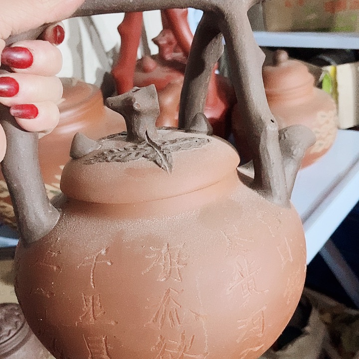 紫砂茶杯宜兴紫砂手工制作