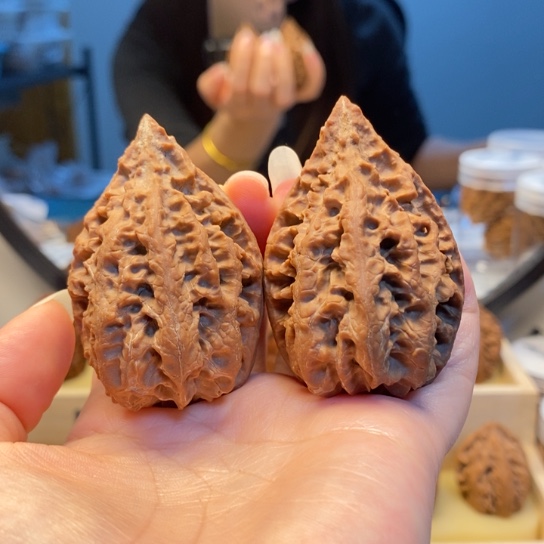 桃核把件金钱底塔尖