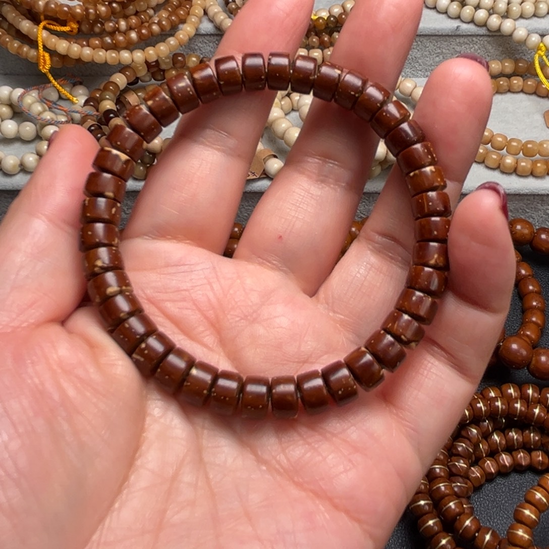 过***客紫金鼠手串实心药片