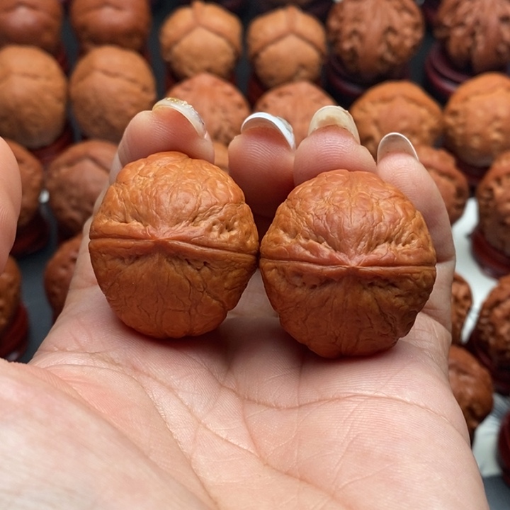 千***眸核桃精品文玩核桃手捻元宝墩