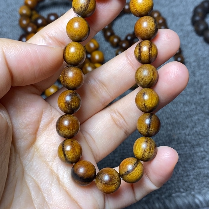 贡木手串印贡1.0圆珠一线天