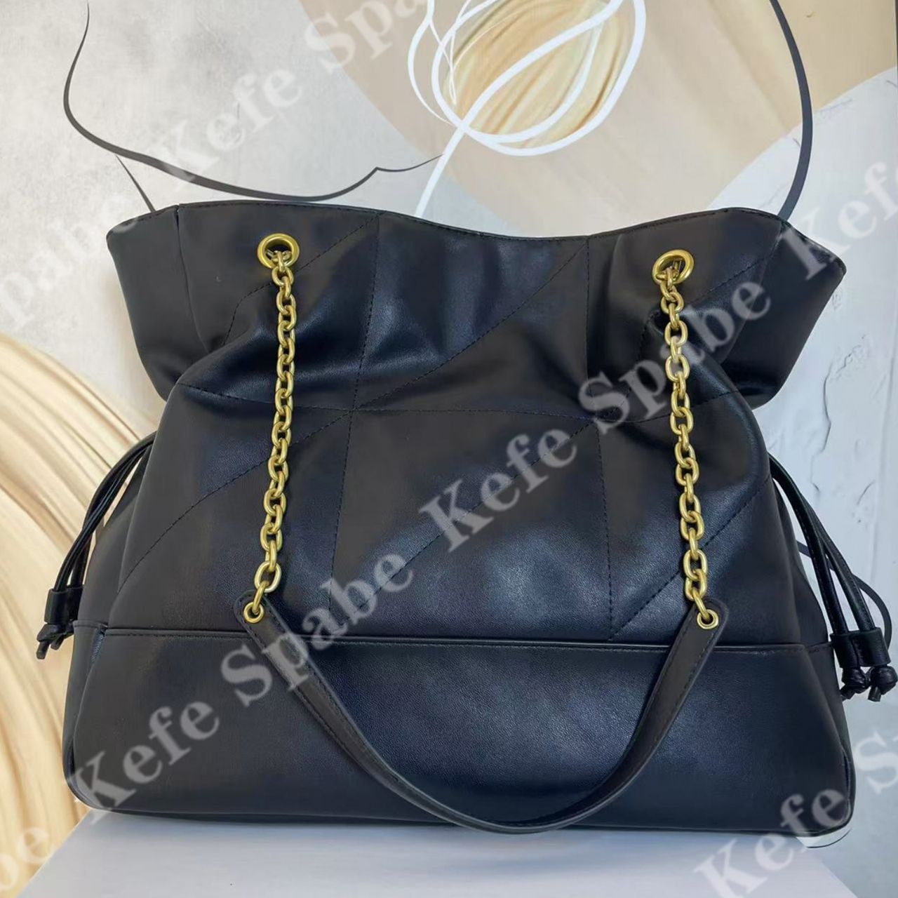 HM02725新款黑色抽绳福袋单肩斜挎链条包-1