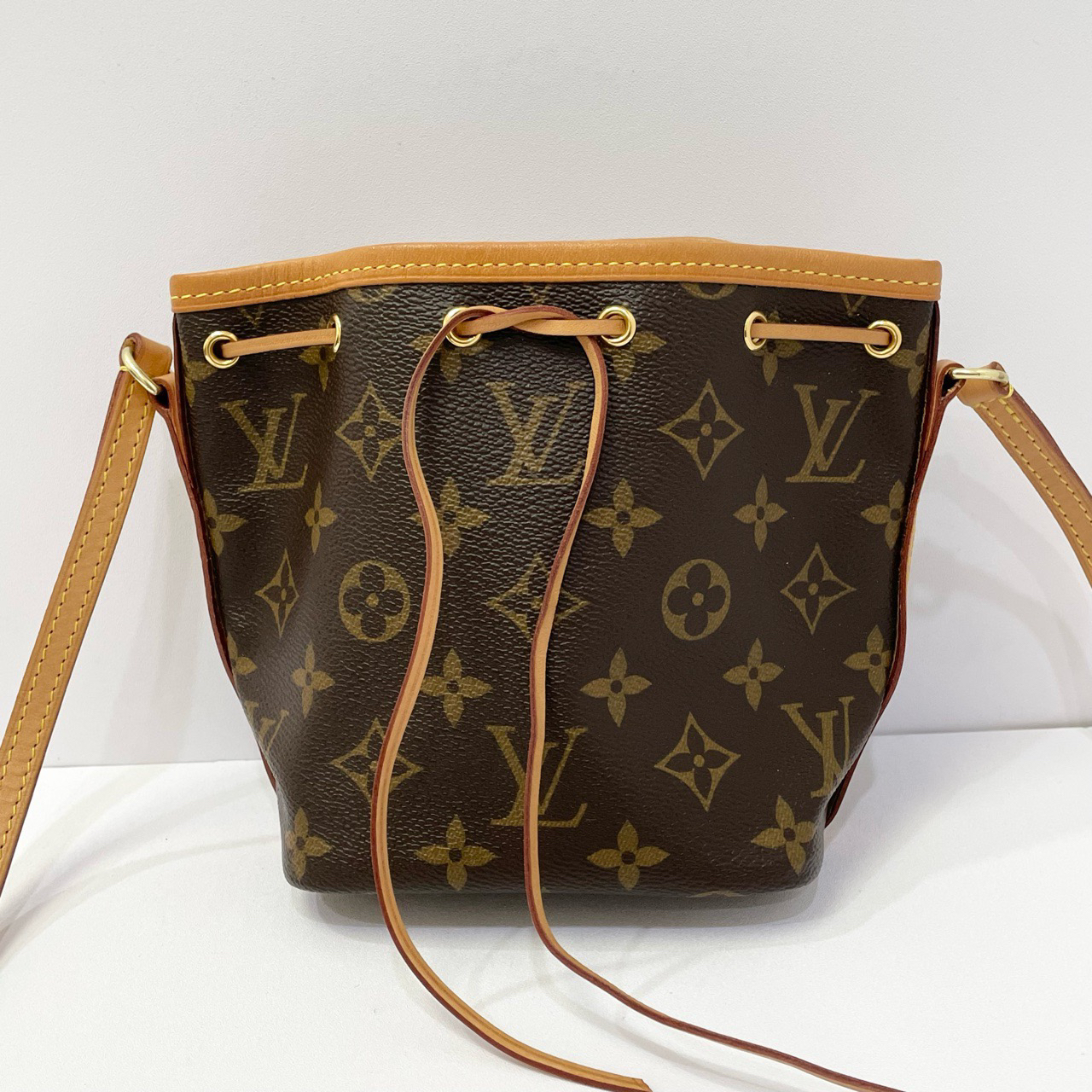 95新 LouisVuitton/路易威登 棕花水桶nano  SA3149 