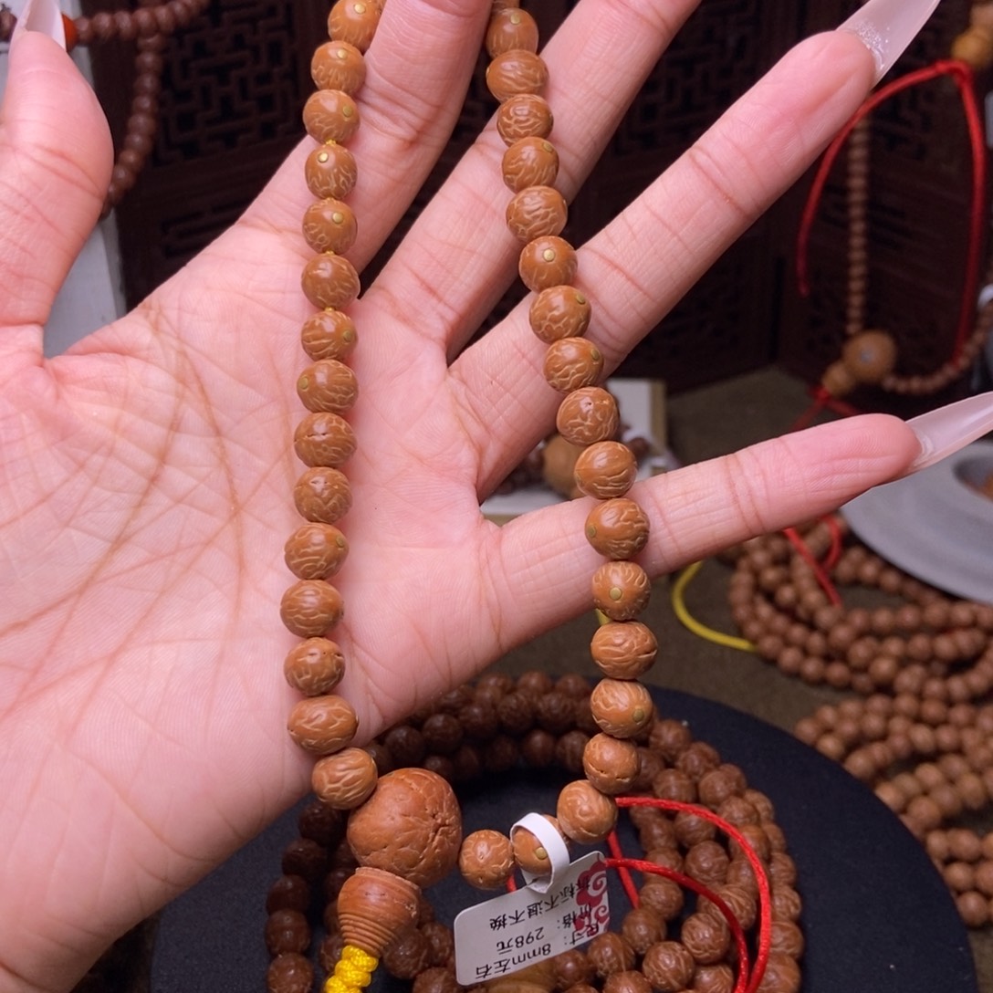 尧***尧凤眼菩提吊坠酸枣核铜钉手持8+