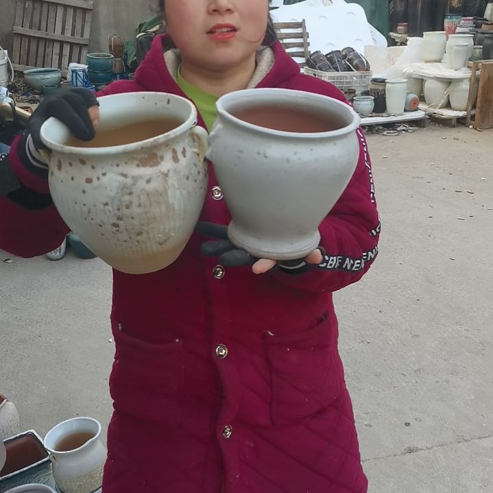 红陶瑕疵两个盆子。。
