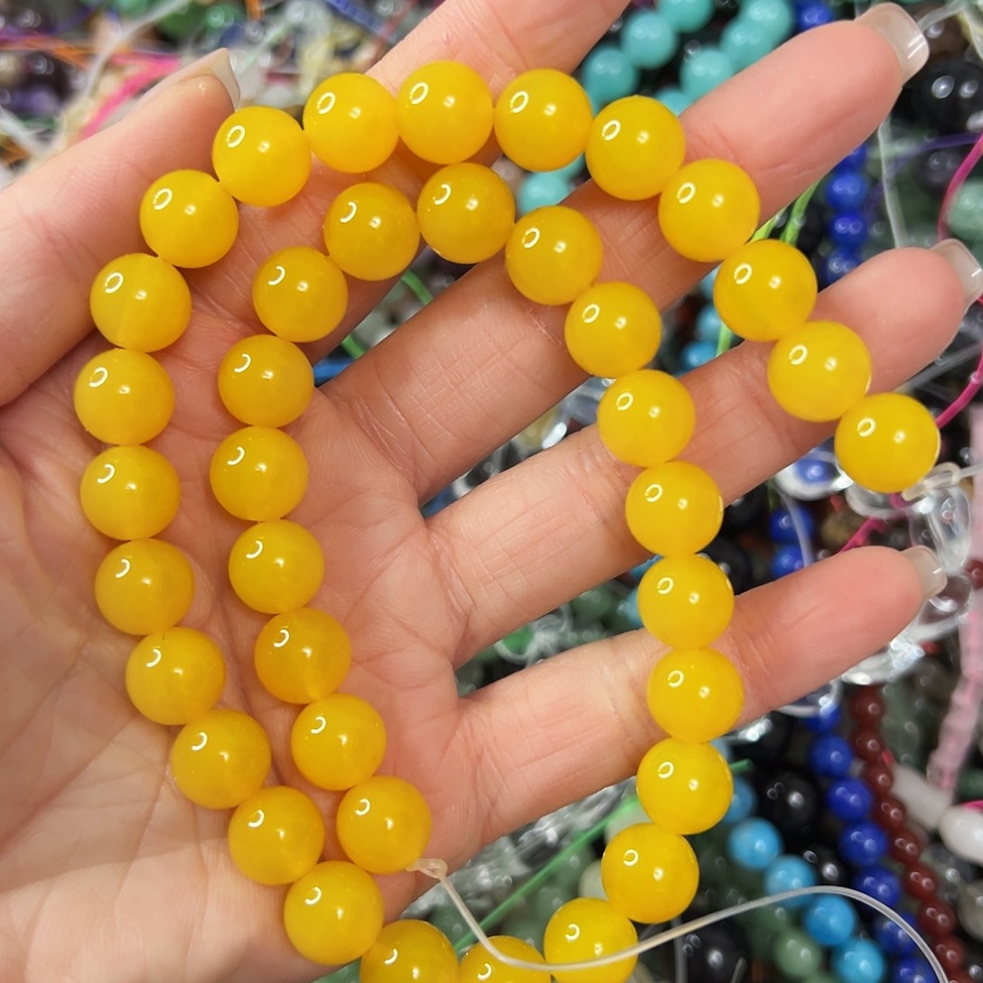 玛瑙/玉髓未镶嵌珠宝半成品，7A卡10蜜蜡黄玛瑙一条