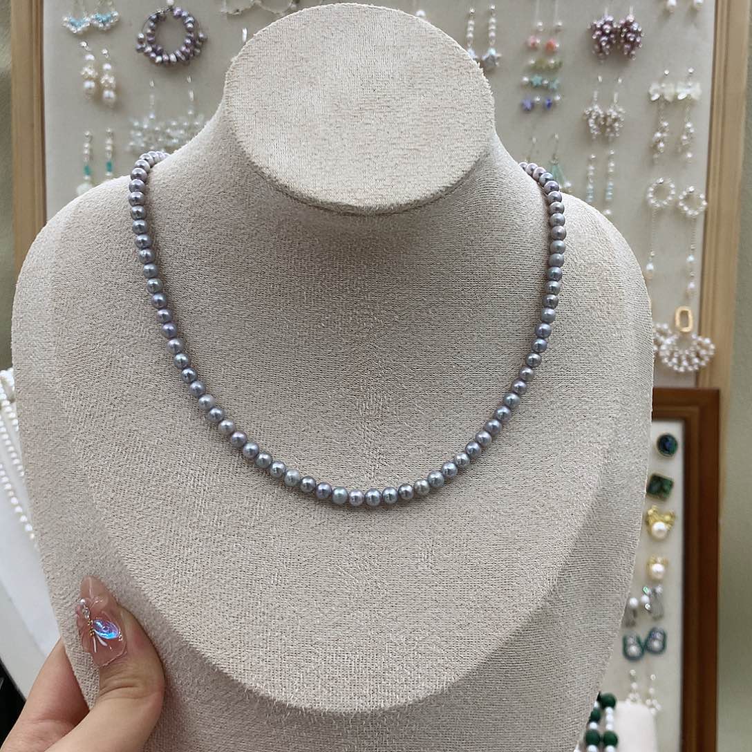 淡水珍珠银S925镶嵌耳饰