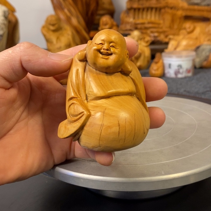 柏木（崖柏）弥勒佛手把件