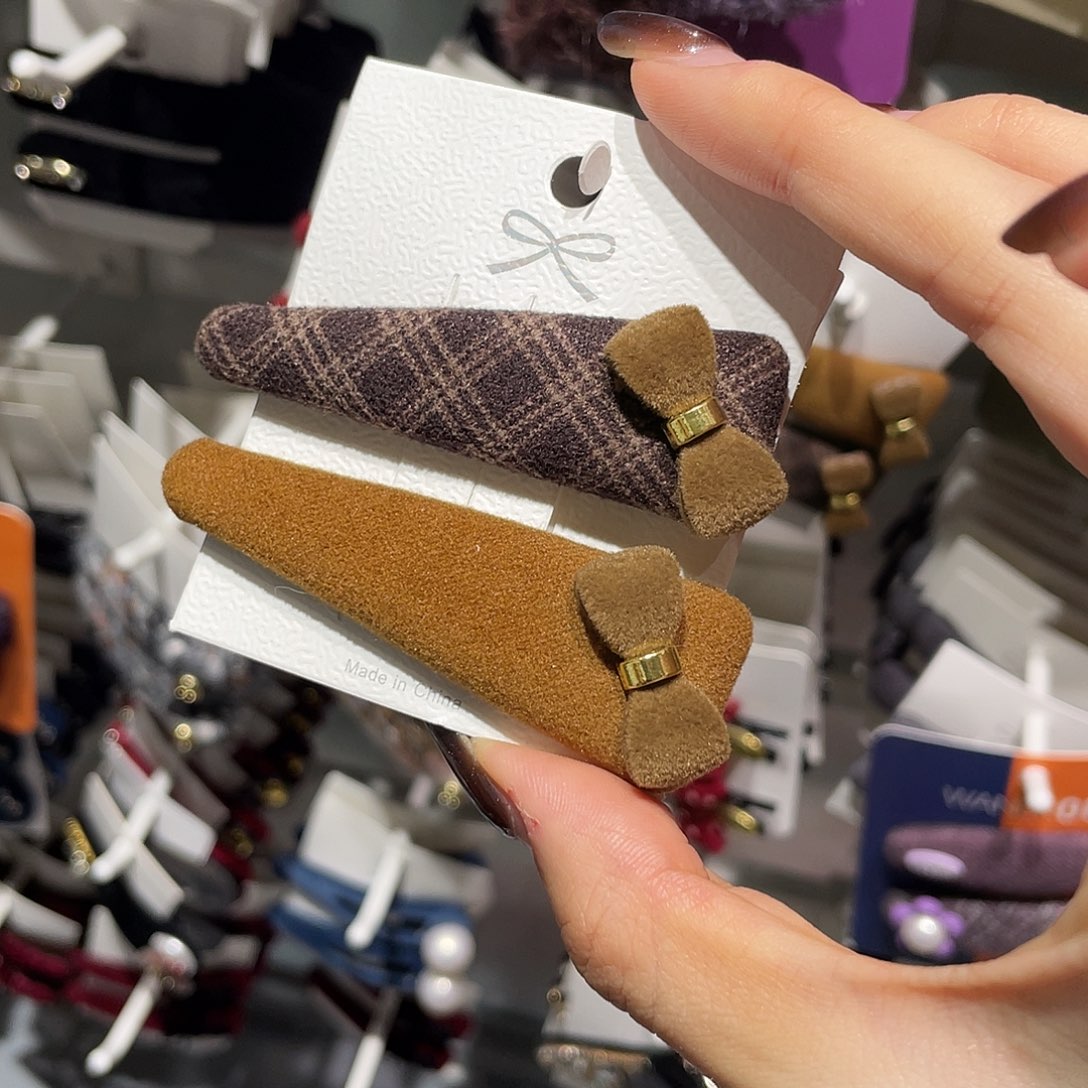 羽毛非金属咖色咖格蝴蝶结