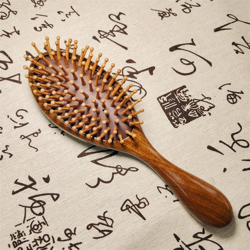 约200mm*60mm檀木气垫梳