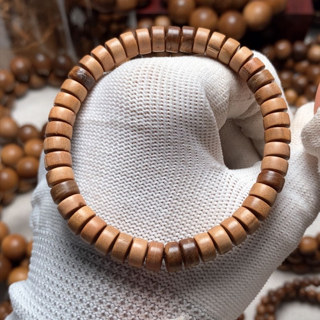 檀香木其他4*7 药片珠瑕疵款