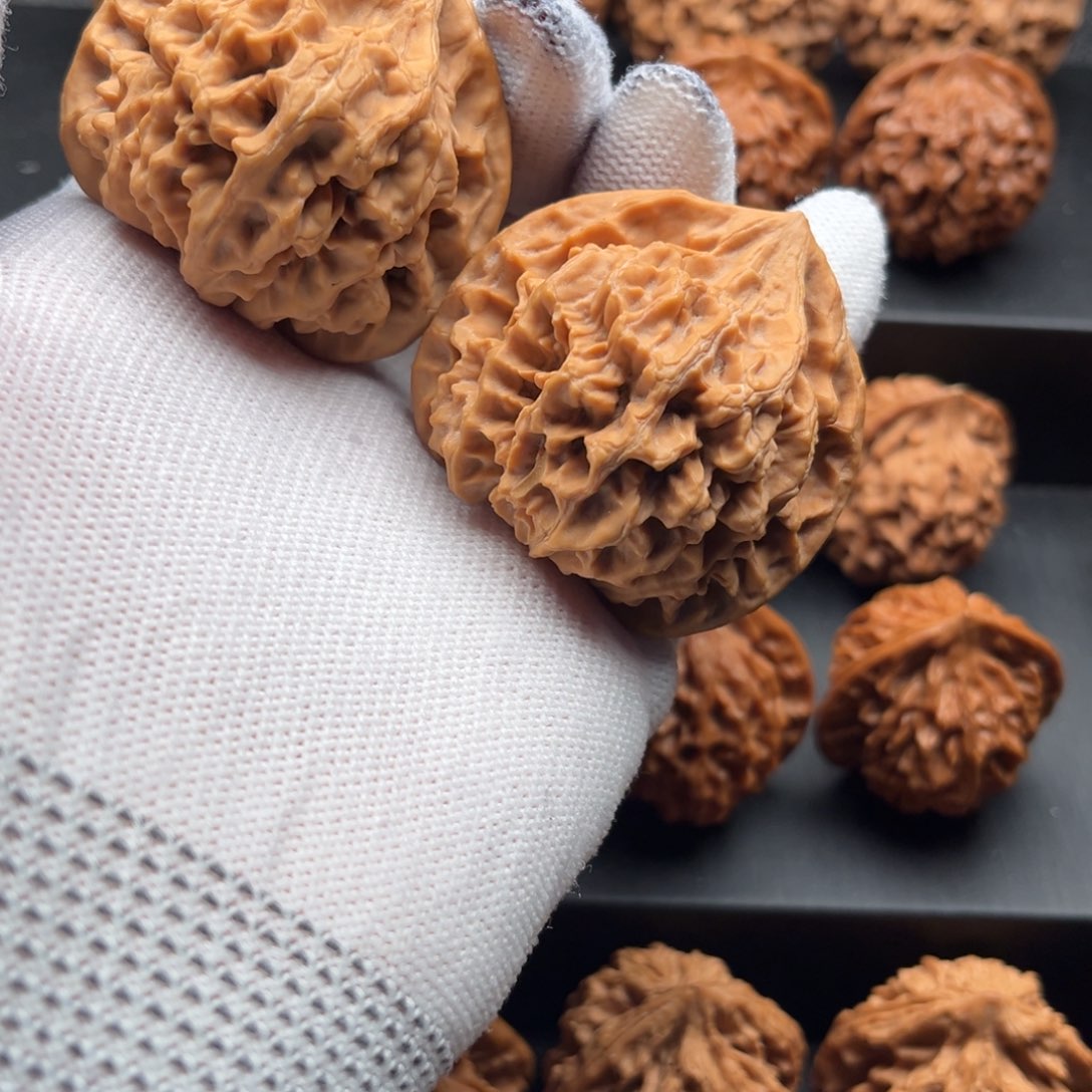 啊***咧文玩核桃把件大花