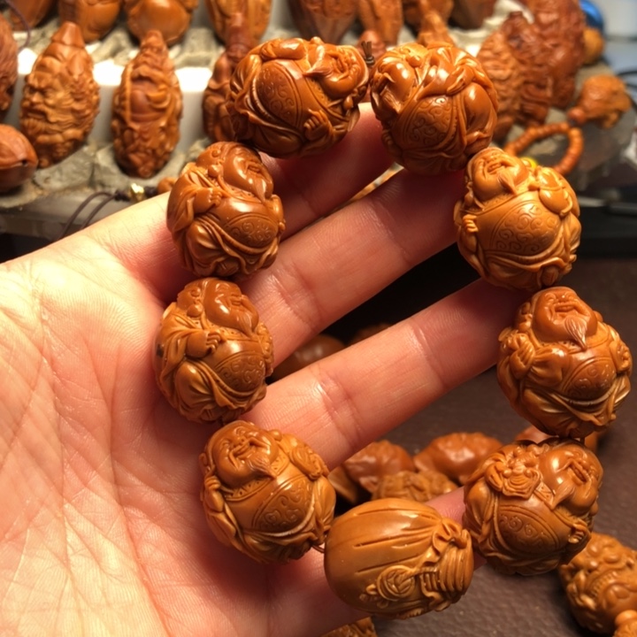 青***轻橄榄核吊坠橄榄核雕刻的手串